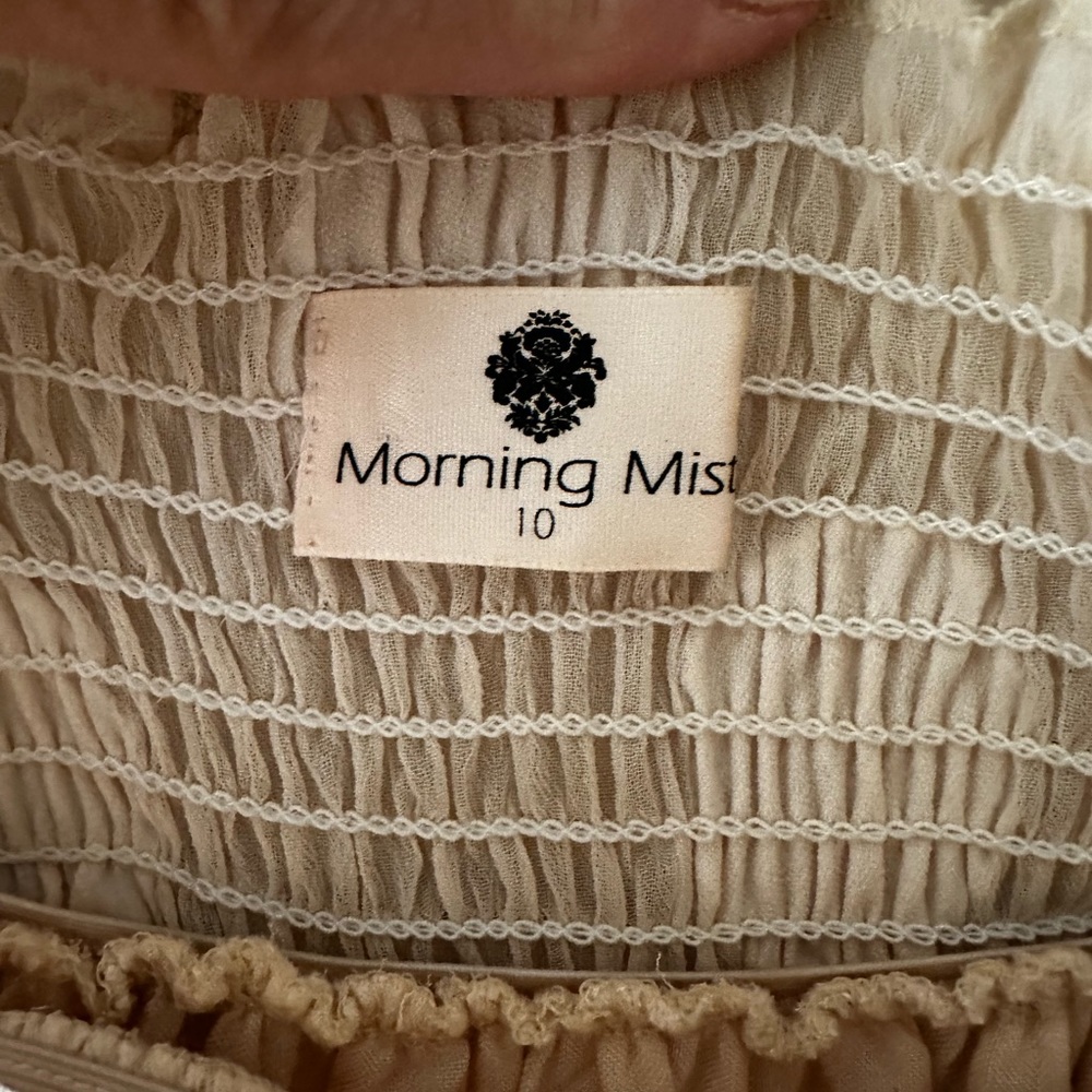 Light pink polka dot top by Morning Mist.